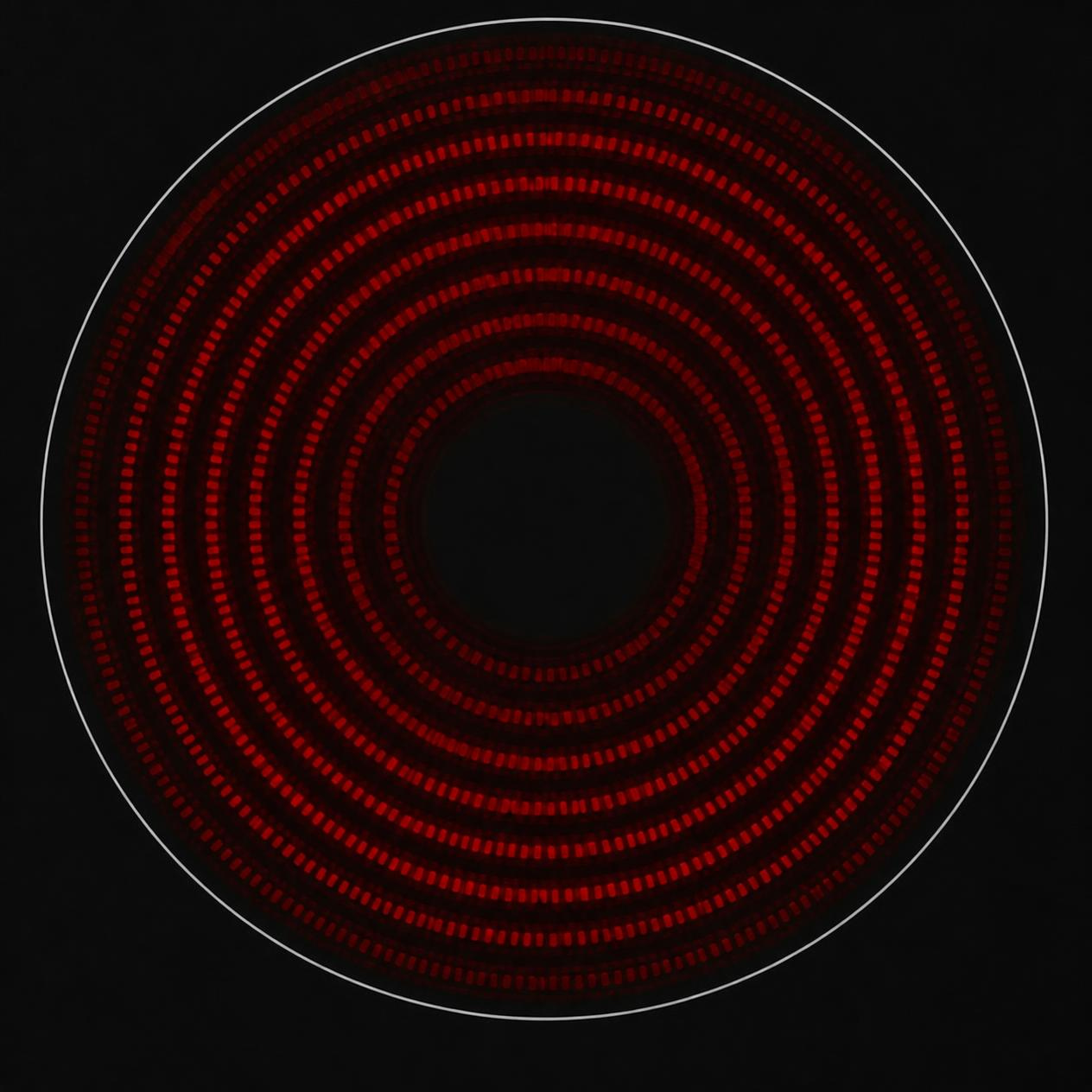 Glowing induction hob element on black glass